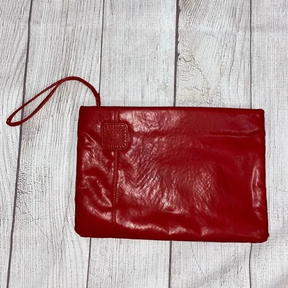 Clutch purse with wrist strap, zipper closure red